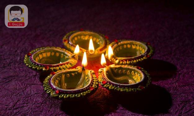 Clay diya lamps lit during Diwali Celebration. Greetings Card Design Indian Hindu Light Festival called Diwali